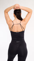 NOXVIA NOVA Open-Back Sculpt Top in Midnight Black, close-up back view showing the double-strap open-back design and NOXVIA branding
